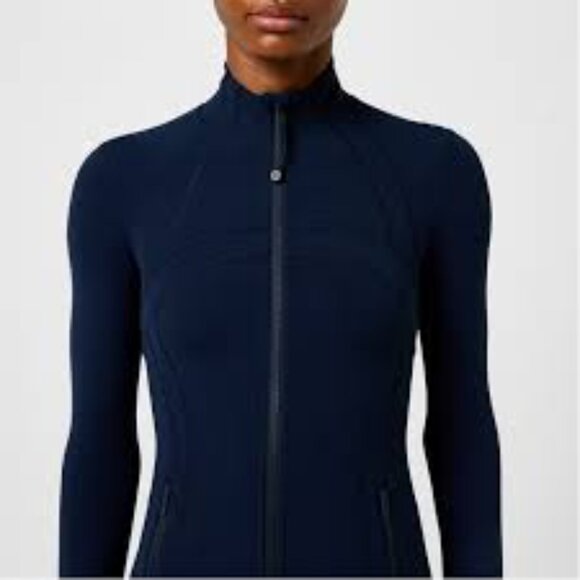Lululemon Athletica navy
Luon Define
Size 12
Zipup jacket
Thumb holes 
Pockets - Picture 8 of 14